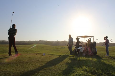 IMAGE: Youngsters playing golf