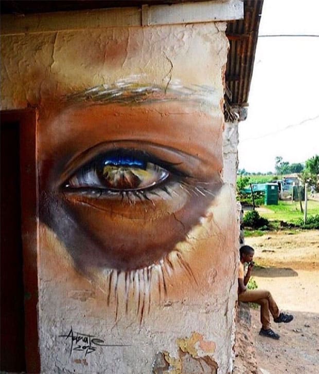 Graffiti of a boy’s eye in Johannesburg by street artist Adnate
