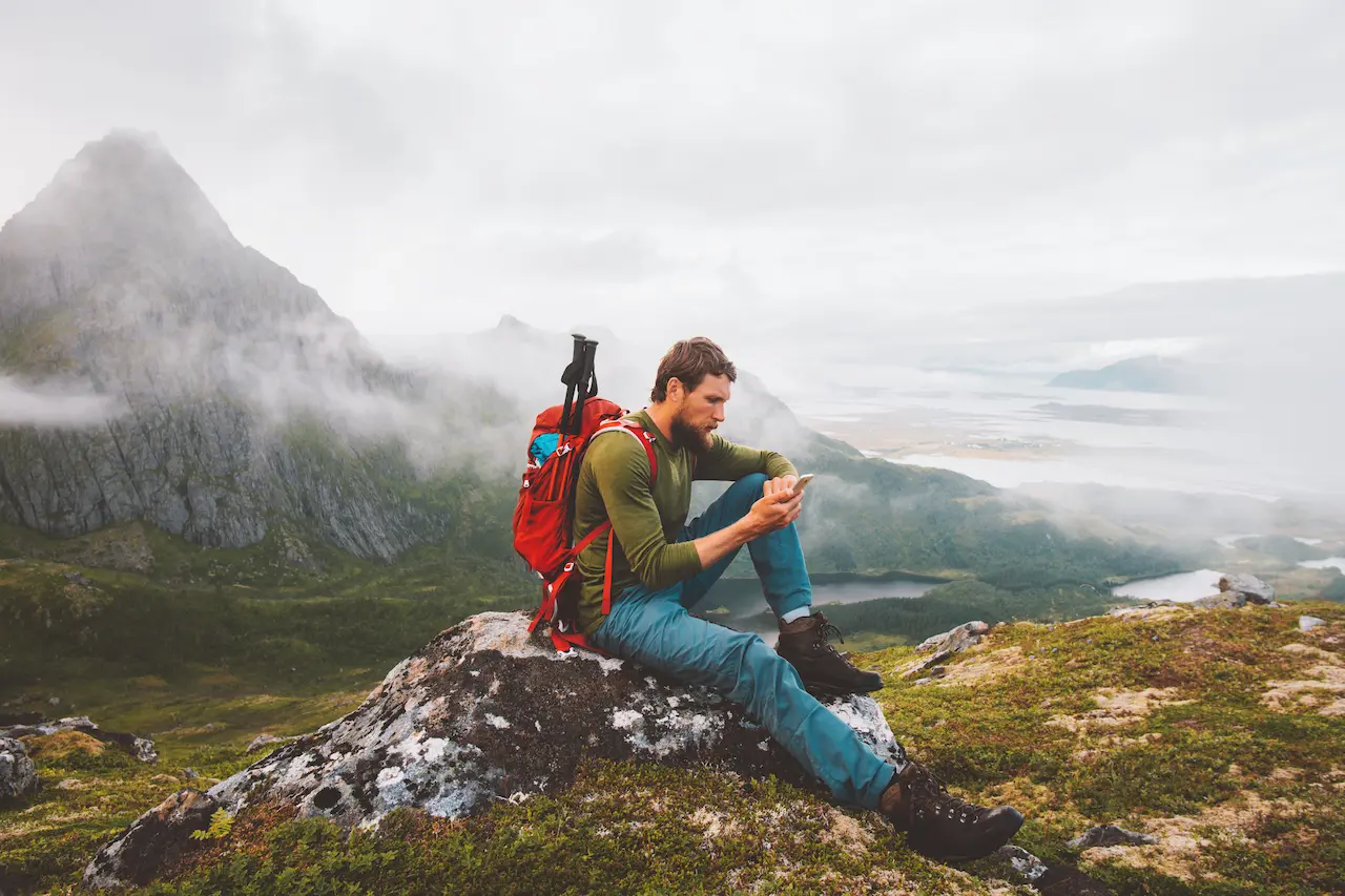 Man Using Smartphone Hike in Mountains Travel