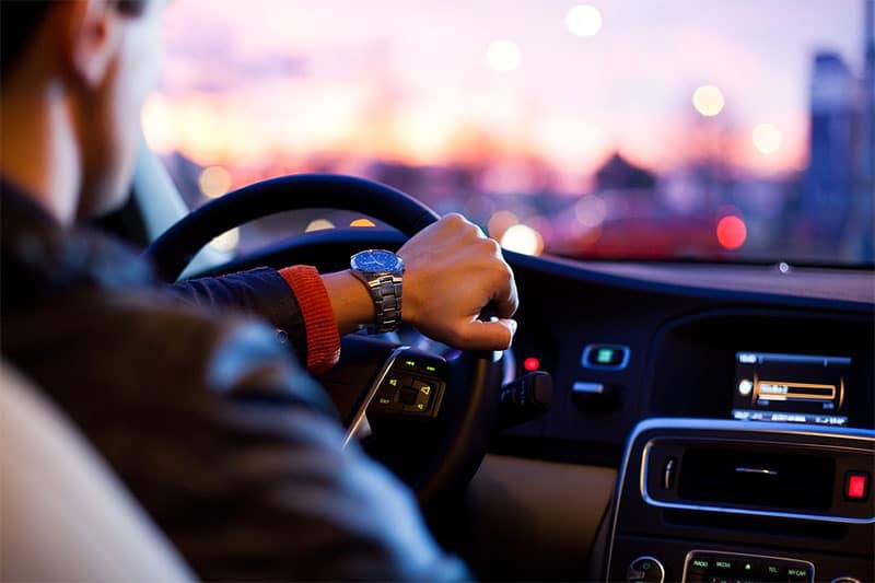 driver behind wheel